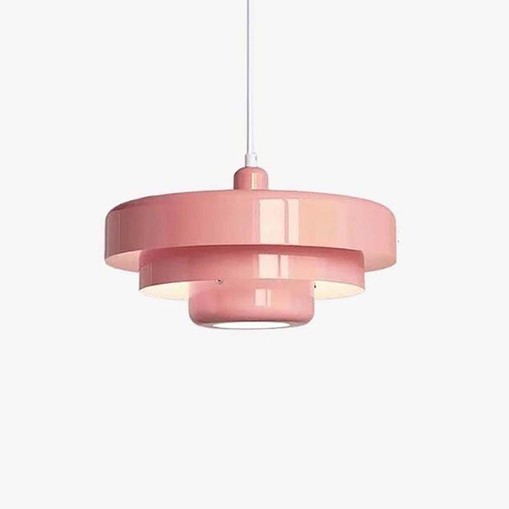 Pink SKIVE pendant light with layered metal shade, Scandinavian retro style, perfect for UK dining or kitchen lighting