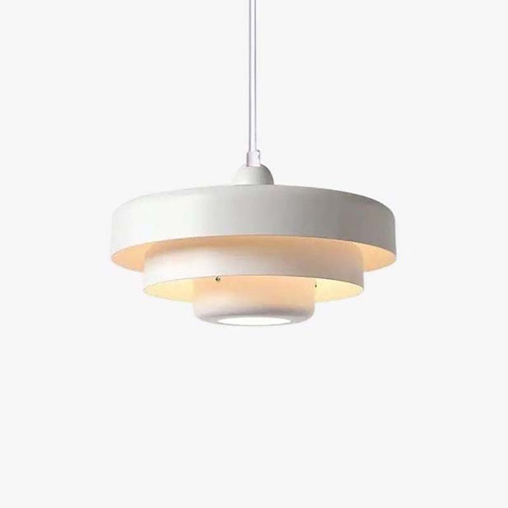 White SKIVE pendant light with layered metal shade, Scandinavian retro style, perfect for UK dining or kitchen lighting