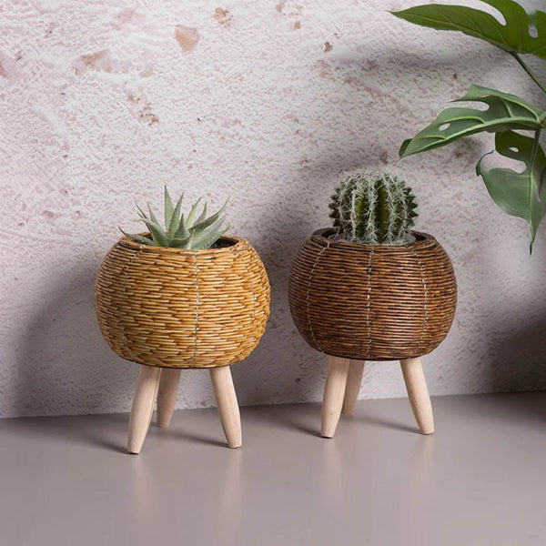 Round rattan plant baskets with short wood legs, natural finish, styled with succulents, Nordic Essentials uk