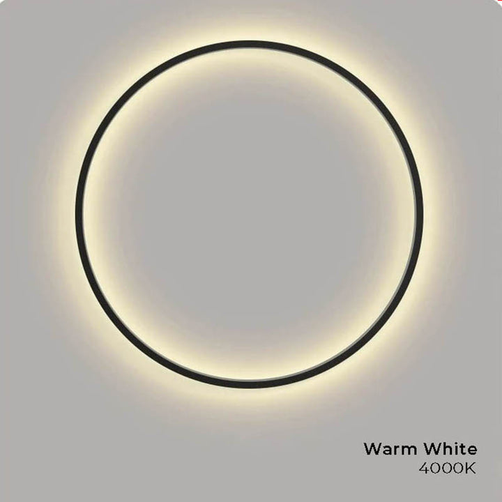 Modern round LED wall sconce in warm white (4000K), black frame, suitable for contemporary bedroom lighting