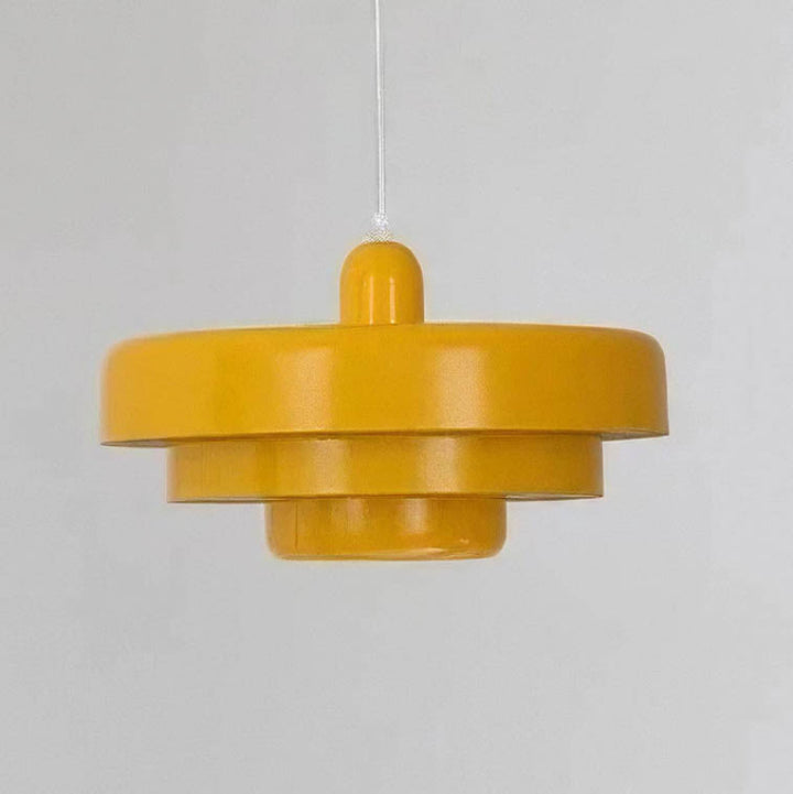 Yellow SKIVE pendant light with layered metal shade, Scandinavian retro style, perfect for uk dining or kitchen lighting