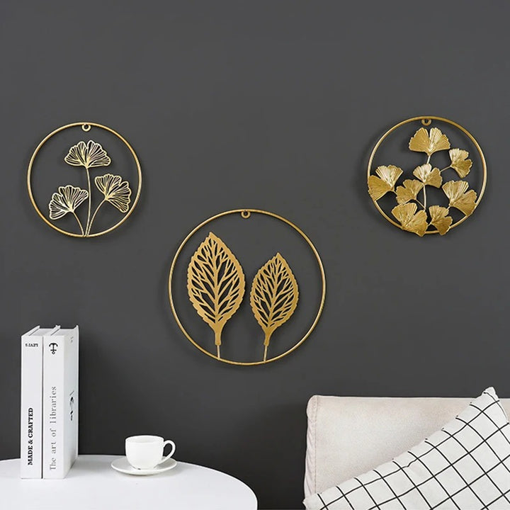 Elegant polished metallic Ginkgo leaf wall ornament, perfect for enhancing living room or bedroom interiors