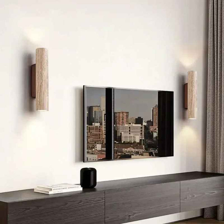 Modern living room with a TV mounted on the wall, wooden console table, and Nordic Wall Lights.