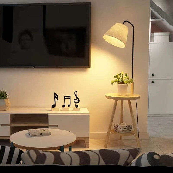 Floor lamp with tea table in living room, natural wood and cream linen shade, perfect for UK modern home décor. pic3