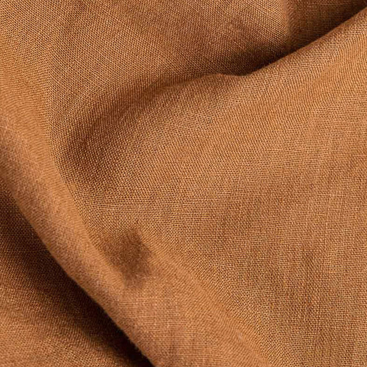 Close-up of pure linen fabric with visible texture