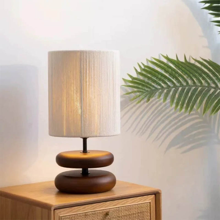 Ring boho table lamp with a Japandi-inspired natural wood base and fabric shade, perfect for cozy bedroom or living room lighting.