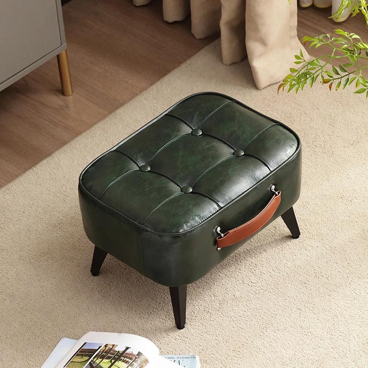 Green ottoman styled in bedroom corner – Scandinavian home accent with faux leather finish