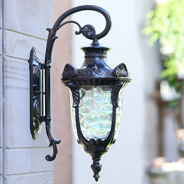 HAVEN – Retro Outdoor Wall Light, a waterproof garden sconce for warm, stylish, energy-efficient lighting. Made of aluminum in Black.