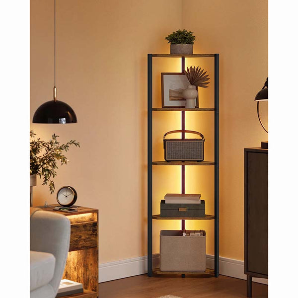 Tall black shelving unit with decorative items in a room setting.