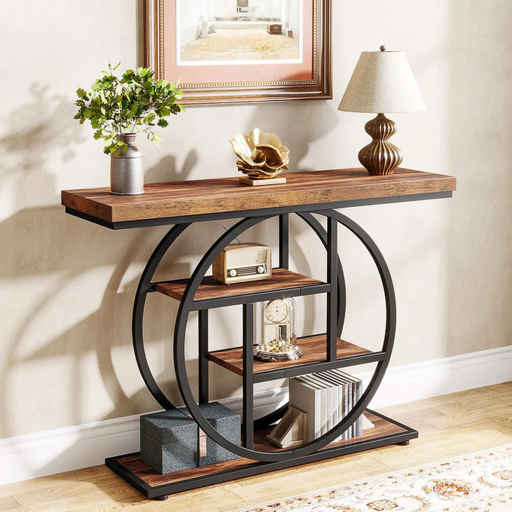 Console table with wooden top and metal circular design in a room setting.
