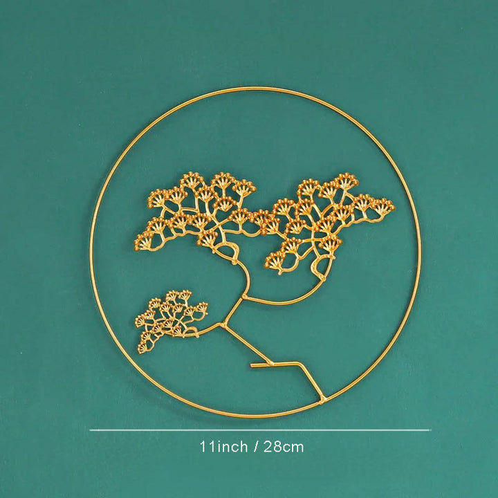 Polished metal Ginkgo leaf wall art by Nordic Essentials, measuring 11inch, ideal for modern home decor.ver9