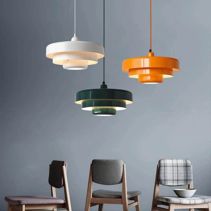 SKIVE Nordic pendant lights in white, green, and orange, layered metal design, ideal for modern kitchens and dining areas