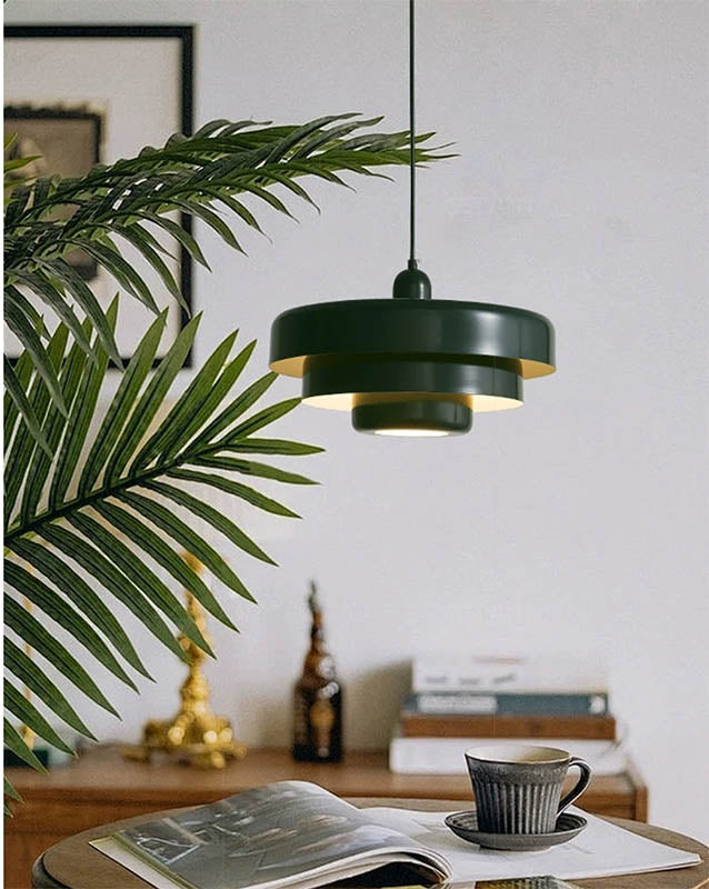 Green SKIVE Nordic pendant lamp with tiered metal shade, warm light for reading nooks, living rooms, or cosy interiors