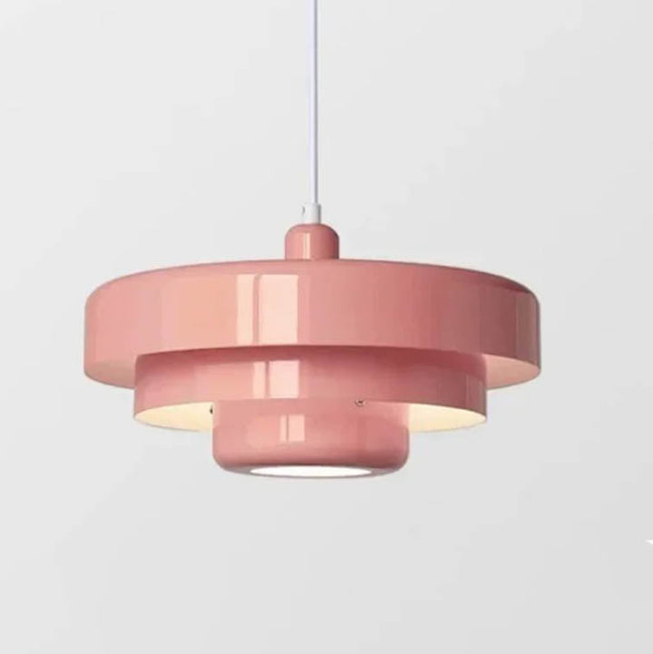 Pink SKIVE pendant light with layered metal shade, Scandinavian retro style, perfect for uk dining or kitchen lighting