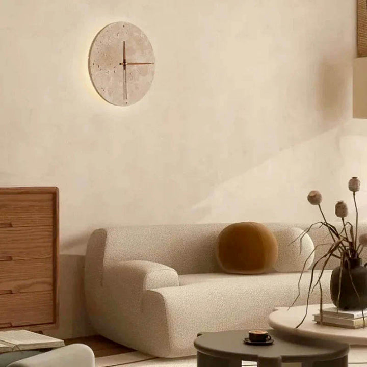 Modern stone wall clock with integrated LED light, combining minimalist design and functional lighting for contemporary interiors.