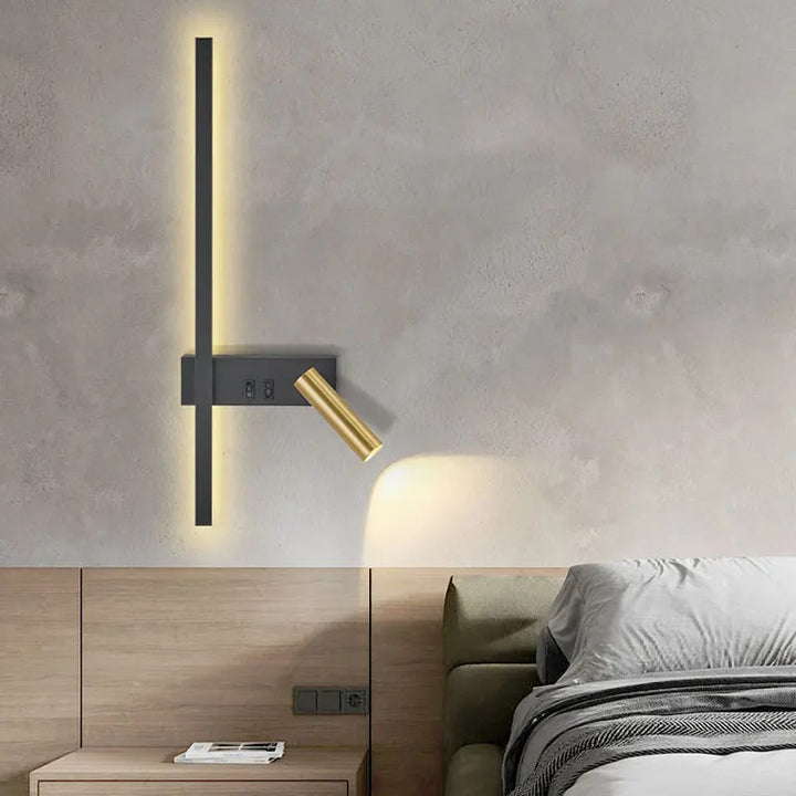 Modern Nordic wall lamp with vertical LED strip and swivel gold spotlight mounted above bedside table