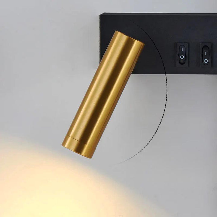 Brushed gold LED spotlight with 350° rotation and 90° tilt, mounted on matte black Nordic wall lamp