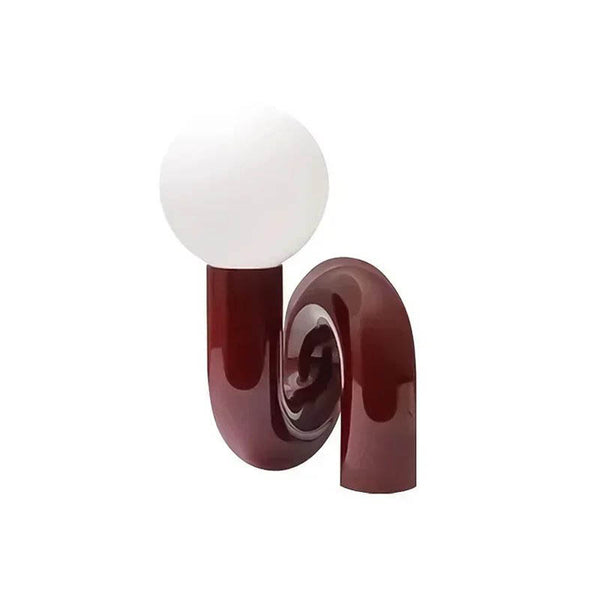 Scandi LED table lamp with a modern curved design, warm ambient lighting, and a sleek finish—perfect for contemporary living rooms and bedrooms.