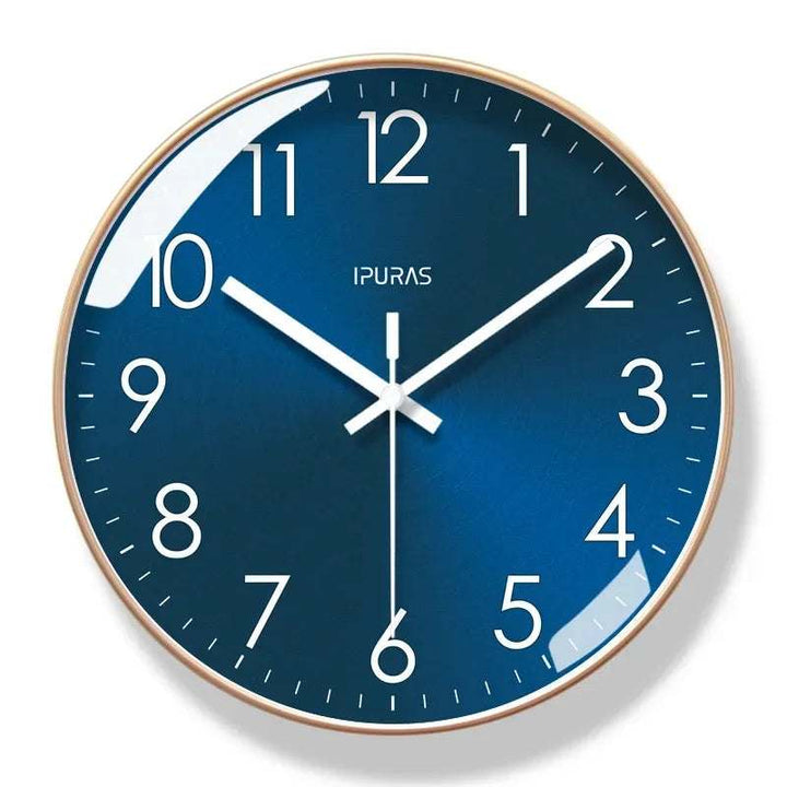 Wall clock with blue face and gold frame on a white background