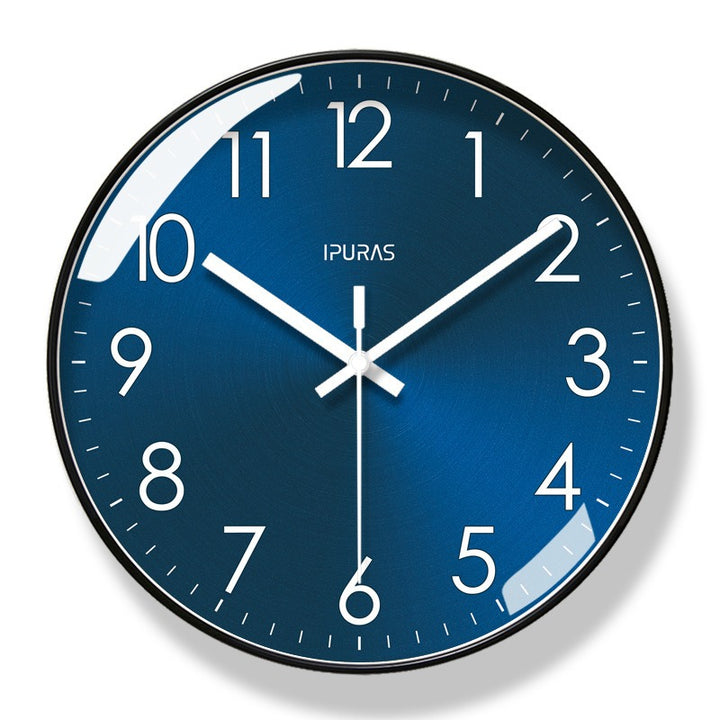 Blue modern wall clock with white hands and numbers on a white background