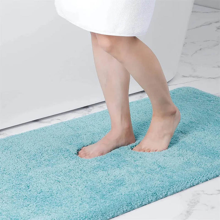 Long Blue absorbent soft bathroom mat  perfect for stepping out of the bath