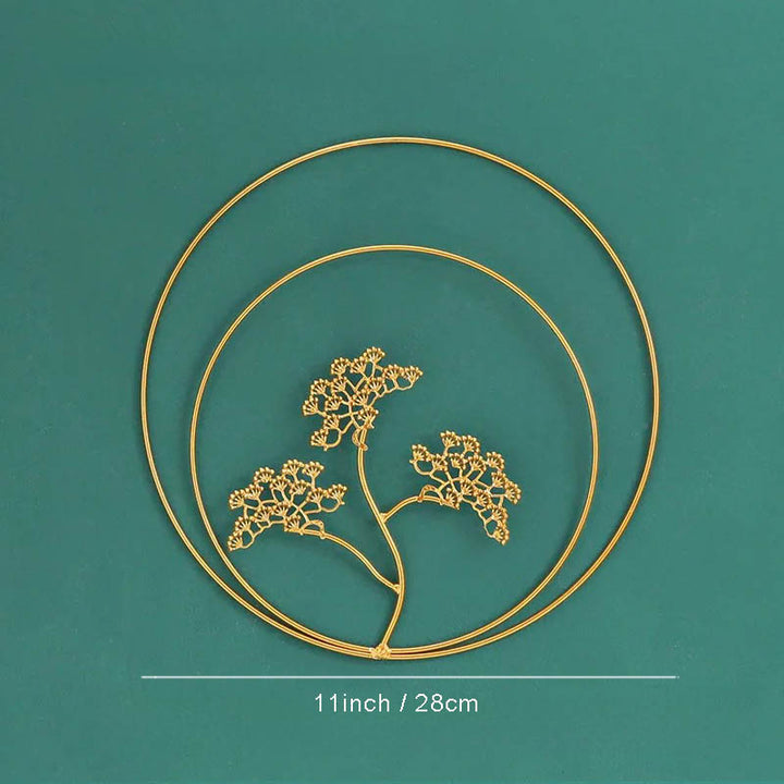 Polished metal Ginkgo leaf wall art by Nordic Essentials, measuring 11inch, ideal for modern home decor.ver12