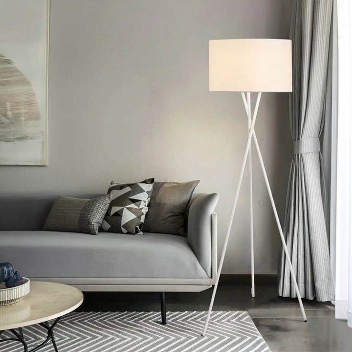 Scandi-style tall tripod lamp in white finish, suits modern interiors and cosy UK living rooms