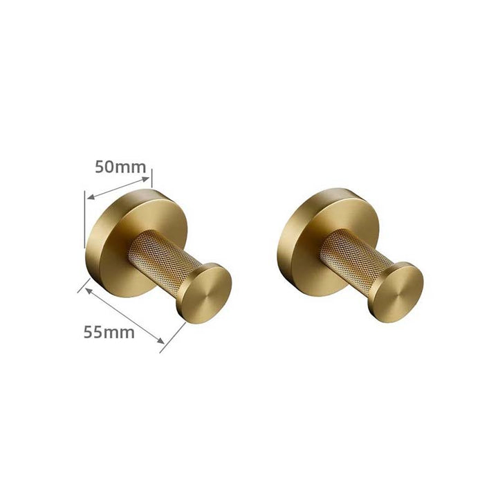 Two gold-colored hooks with measurements on a white background