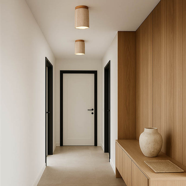 Pair of travertine and walnut ceiling lights in minimalist hallway, perfect for warm Scandinavian uk home lighting