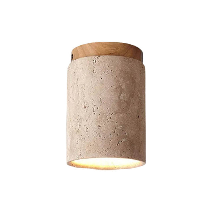 Close-up of natural travertine texture and oak wood on modern Scandinavian ceiling light fitting