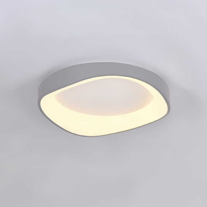 Grey LED ceiling light with curved flush mount design, minimalist Nordic style for modern interiors