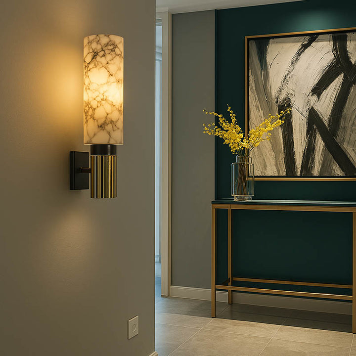  Contemporary marble and brass LED wall light in hallway with teal feature wall, ideal for entryway lighting decor.