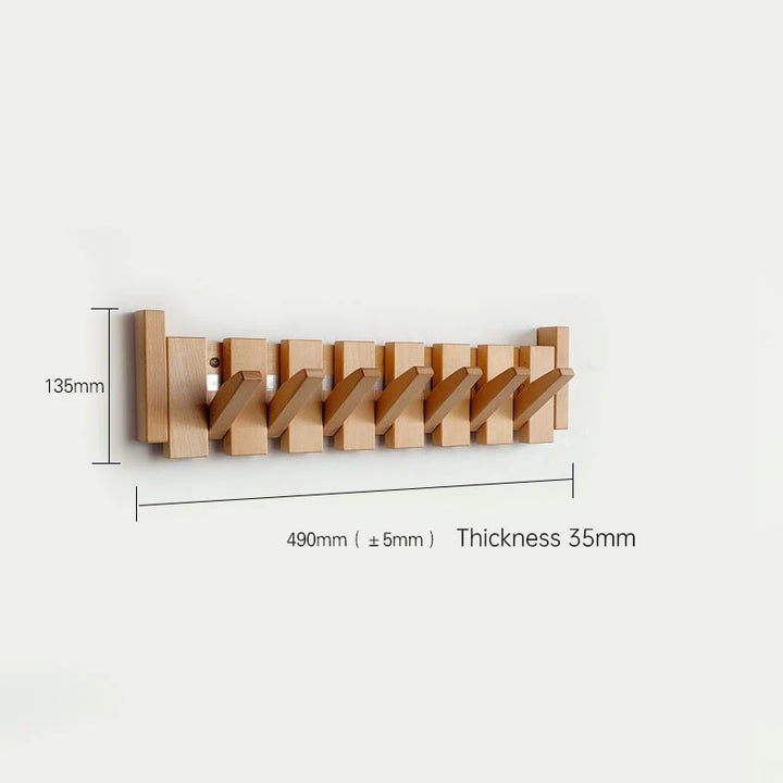 Wooden wall-mounted coat rack with dimensions on a white background