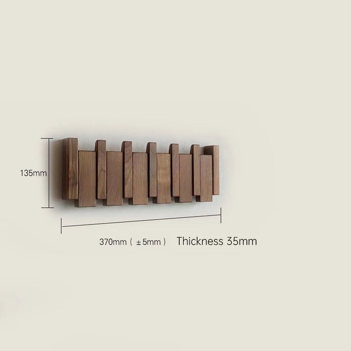 Wooden wall hook with dimensions on a beige background