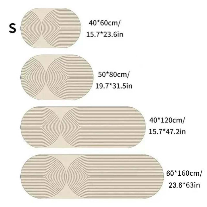 Set of oval kitchen rugs with measurements in centimeters and inches on a white background
