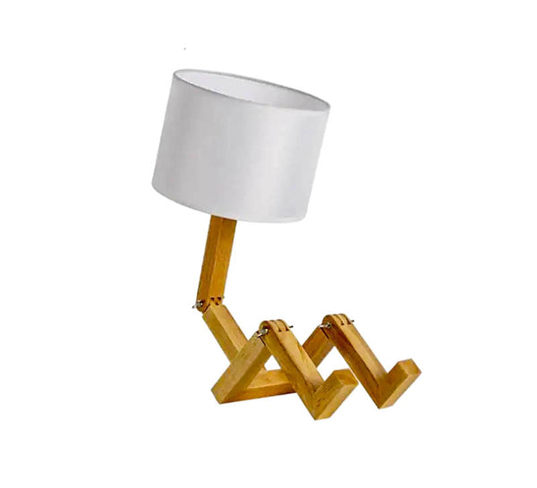 Wooden creative table lamp with a modern design, warm LED lighting, and a natural finish, perfect for decorative home or office ambiance.