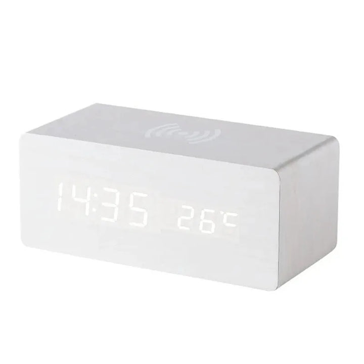 White wooden LED alarm clock with wireless charging pad and digital temperature display
