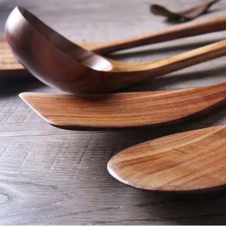 Wooden spoons on a wooden surface