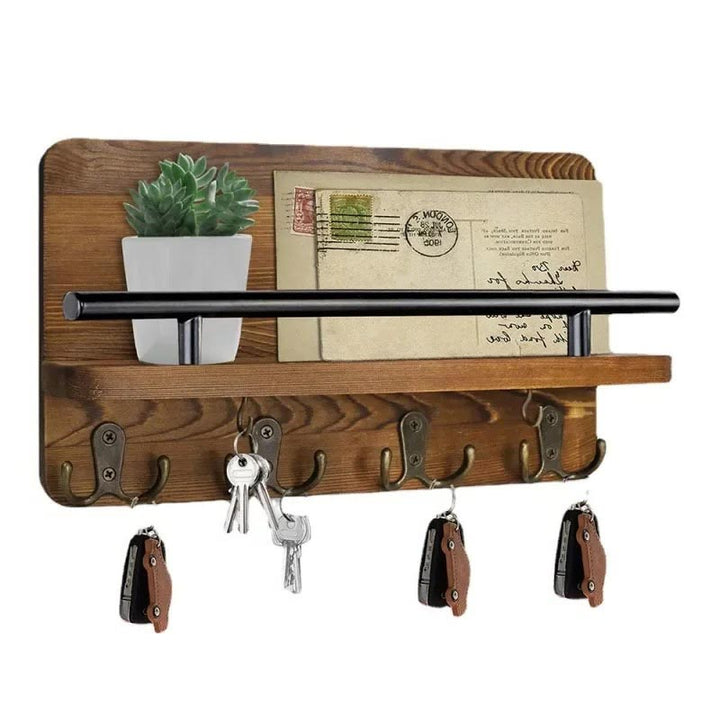 Wooden key holder with shelf and vintage hooks, perfect for hanging coats, keys, and storing accessories in the entryway.