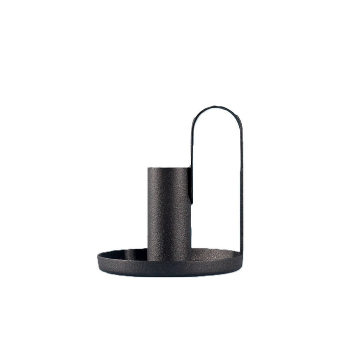 Nordic-style black iron candle holder with minimalist loop handle and round base