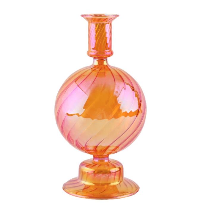 Hand-blown orange-pink gradient glass sphere candle holder with ribbed detailing and pedestal base
