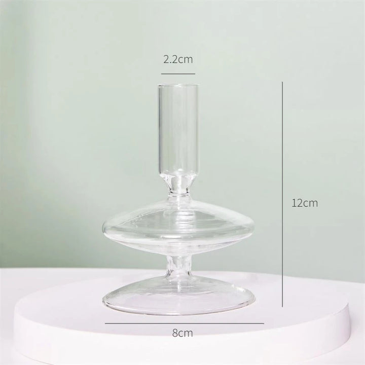 Clear glass taper candle holder measuring 4.7 in (12 cm) tall and 3.1 in (8 cm) wide with 0.9 in (2.2 cm) opening