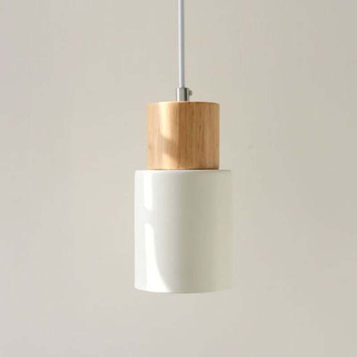 White wooden pendant light with simple cylindrical form, modern Scandinavian home décor style