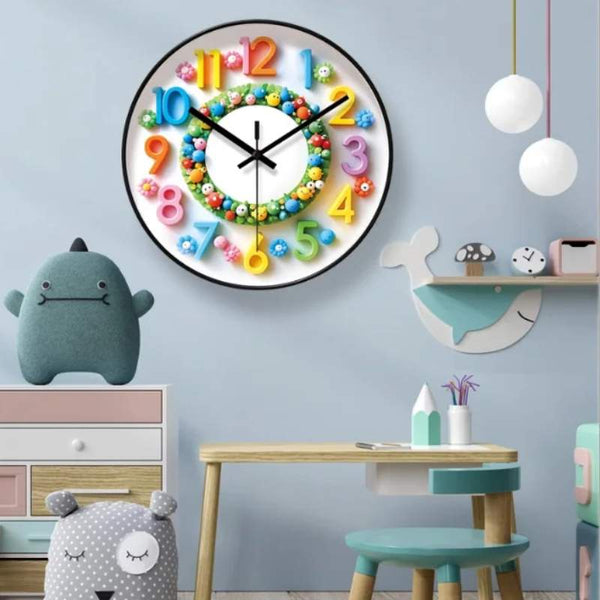Cartoon wall clock with bright 3D numbers hanging in a pastel kids’ study room.