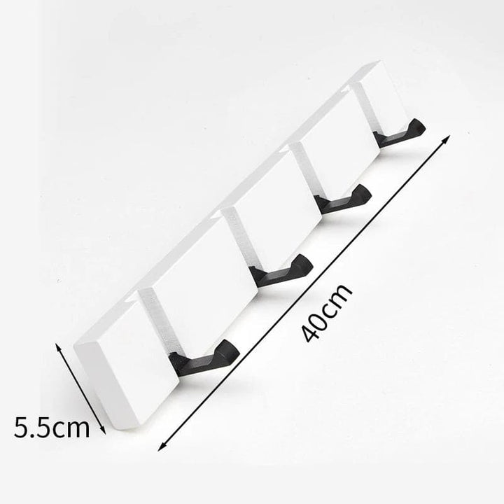 White four-hook wall rack measuring 40 cm (15.7 in) by 5.5 cm (2.2 in) for extra storage.