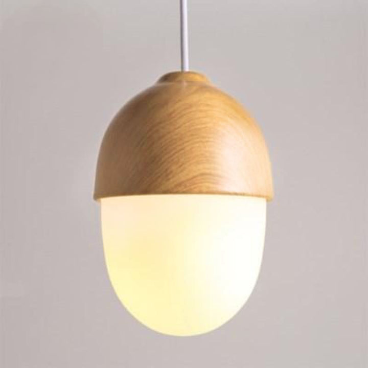 Oval wooden pendant light with frosted glass globe, Nordic minimalist home lighting.