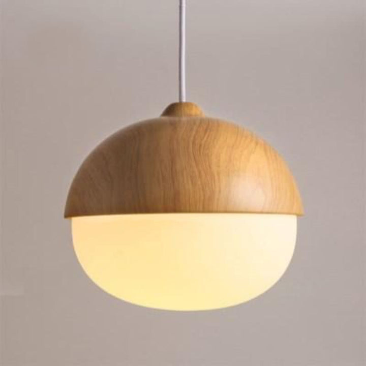 Round wooden dome pendant light with white glass diffuser, soft warm Scandinavian lighting.