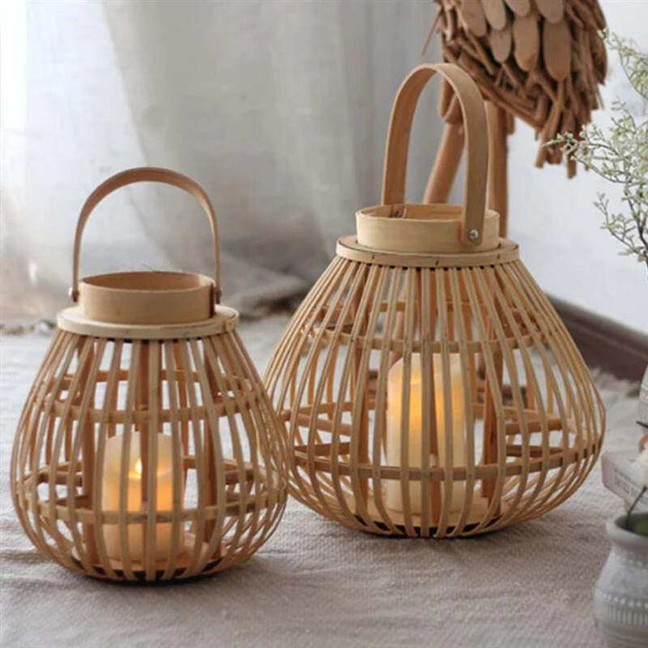 Round bamboo lanterns with handles and pillar candles for modern Scandinavian decor