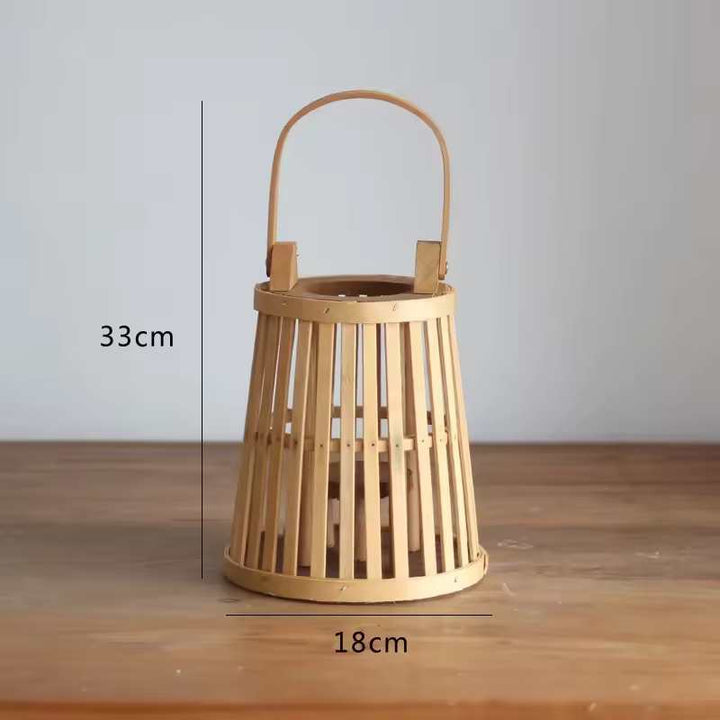 Medium bamboo lantern 33 cm (13 in) height × 18 cm (7 in) width on wooden surface