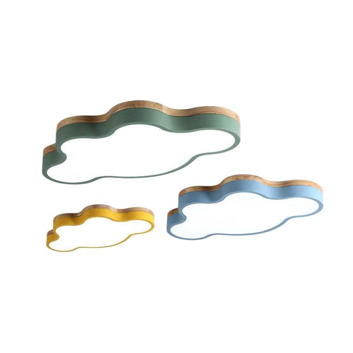 Three Scandinavian cloud ceiling lights in green, blue, and yellow finishes, displayed together.